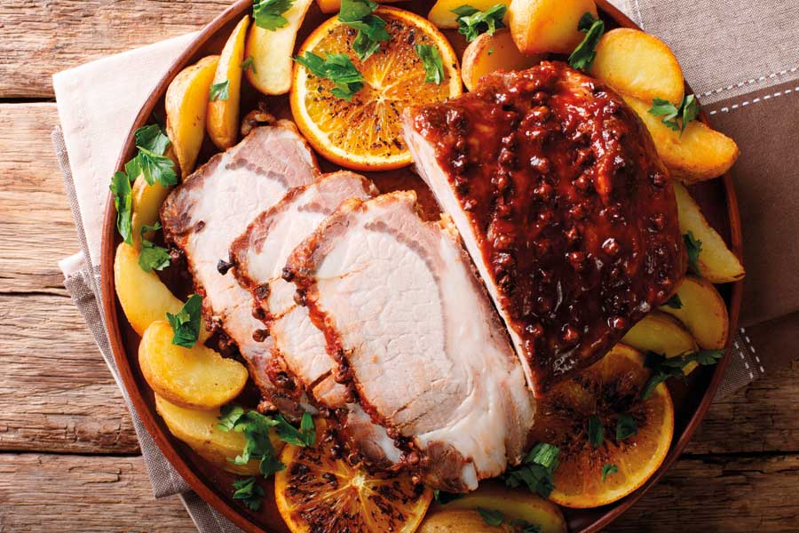 Μπούτι χοιρινό με πορτοκάλι και πατάτες